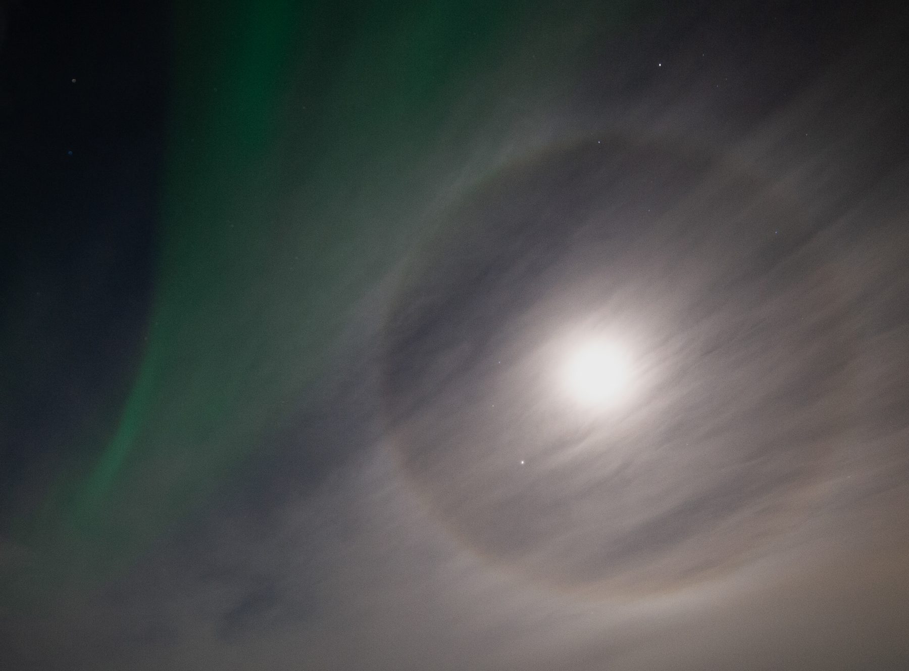 Aurora and the ring around the moon