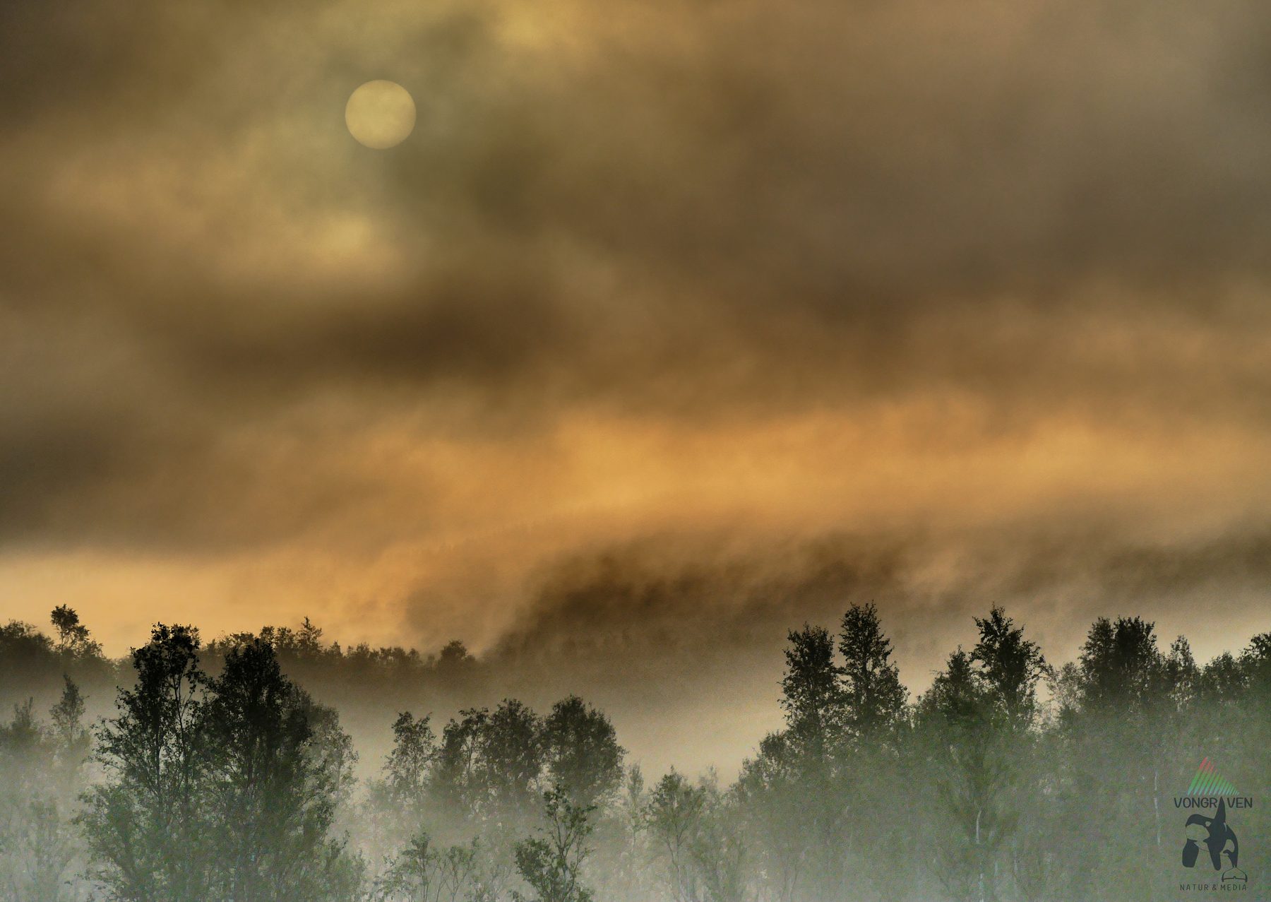 Fiery fog and a sun