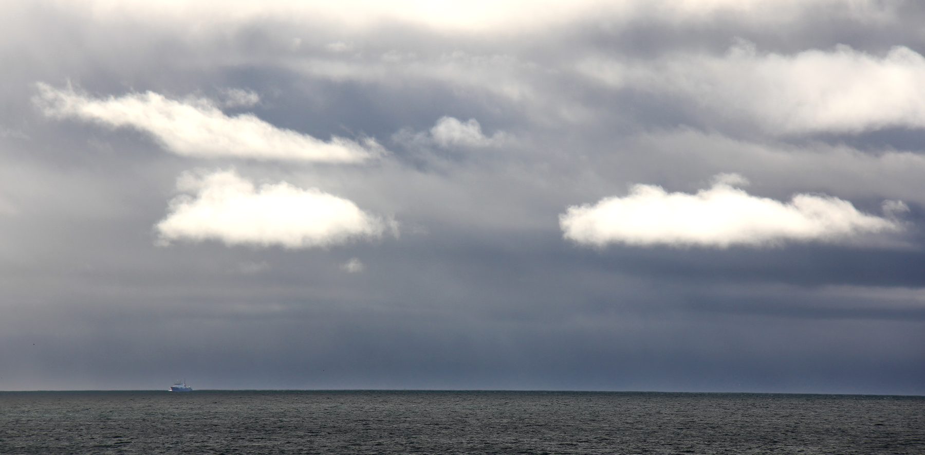 Clouds and a ship