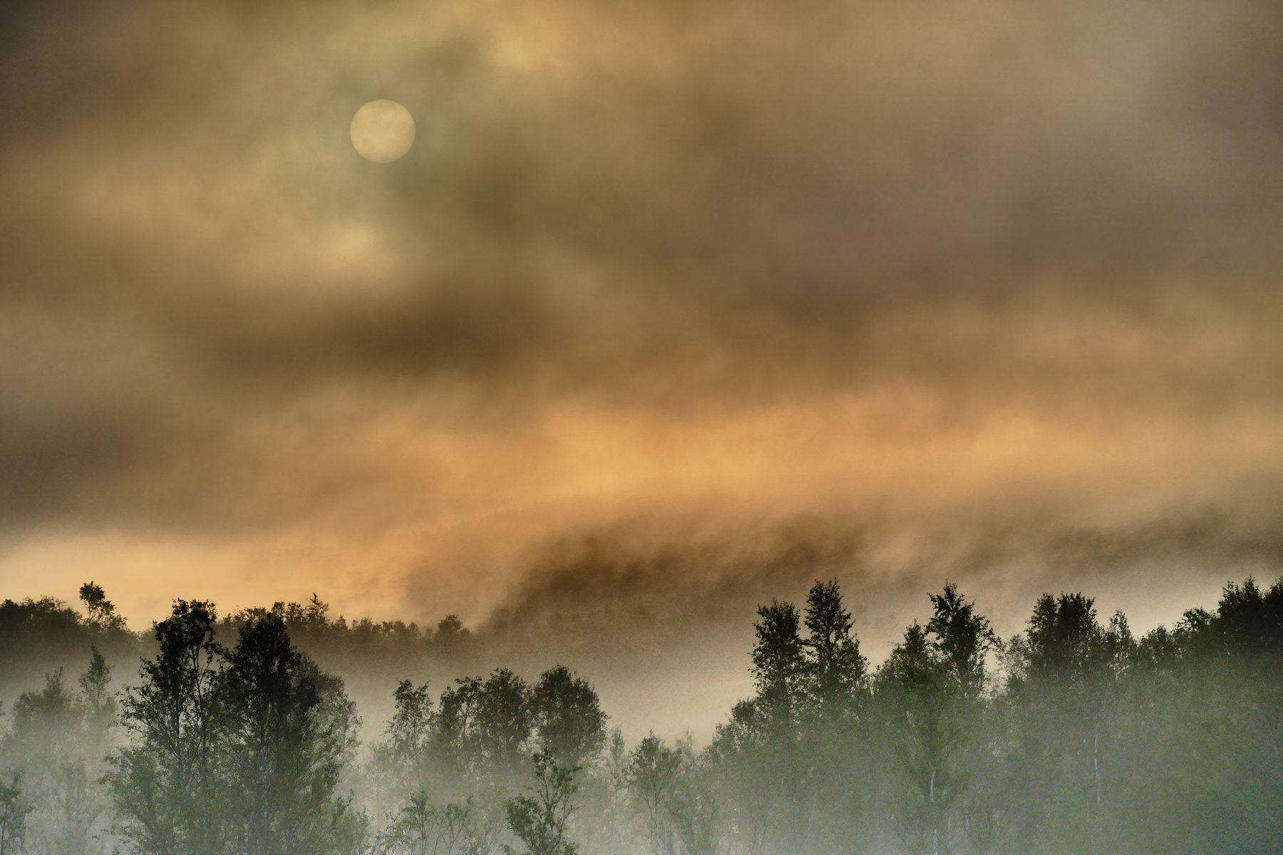Smoking landscape and the sun