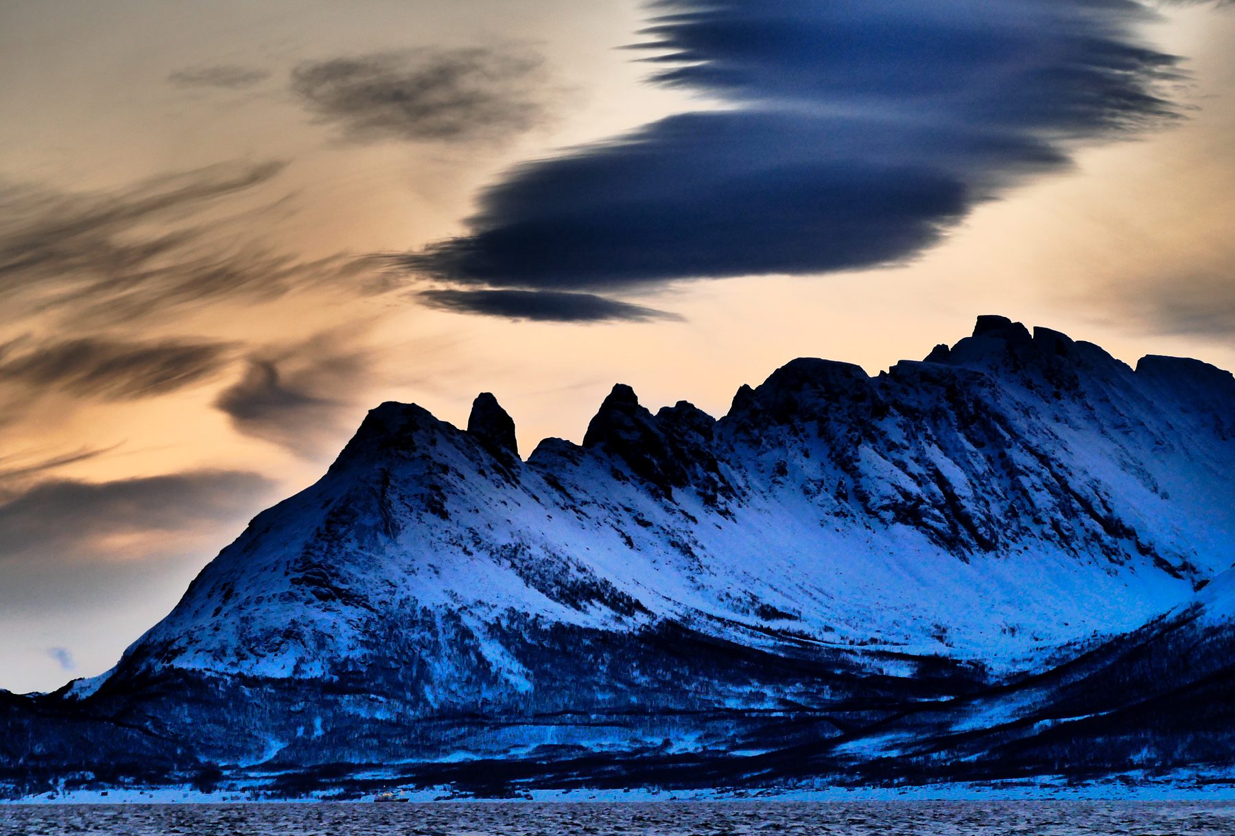 Clouds over a ridge